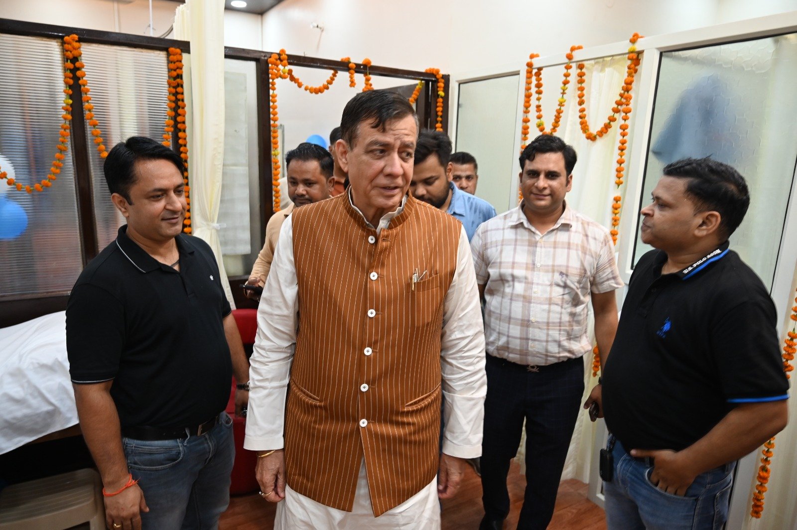 Dr. Parihar welcoming guest at clinic